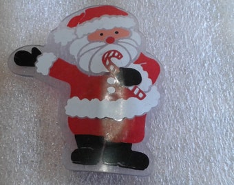 Kerstman met snoepriet gedrukt op doorzichtige plastic nieuwigheidsspeld, Hong Kong-papieren label