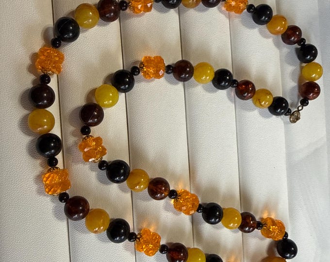 Vintage plastic beaded necklace in imitation of amber