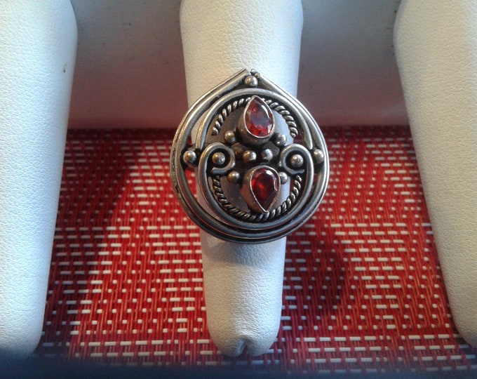 White Metal and Garnet Very Elaborate Teardrop Adjustable Ring, Currently a 9