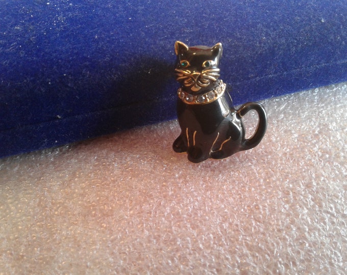 Monet Black Enamel and Goldtone Cat Pin with Green and Clear Rhinestones, Signed