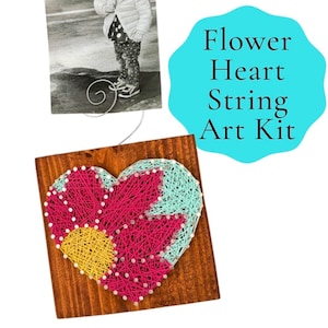 May include: A wooden string art kit with a heart-shaped design. The heart features a flower pattern with pink, yellow, and teal string. The text "Flower Heart String Art Kit" is in a blue bubble.