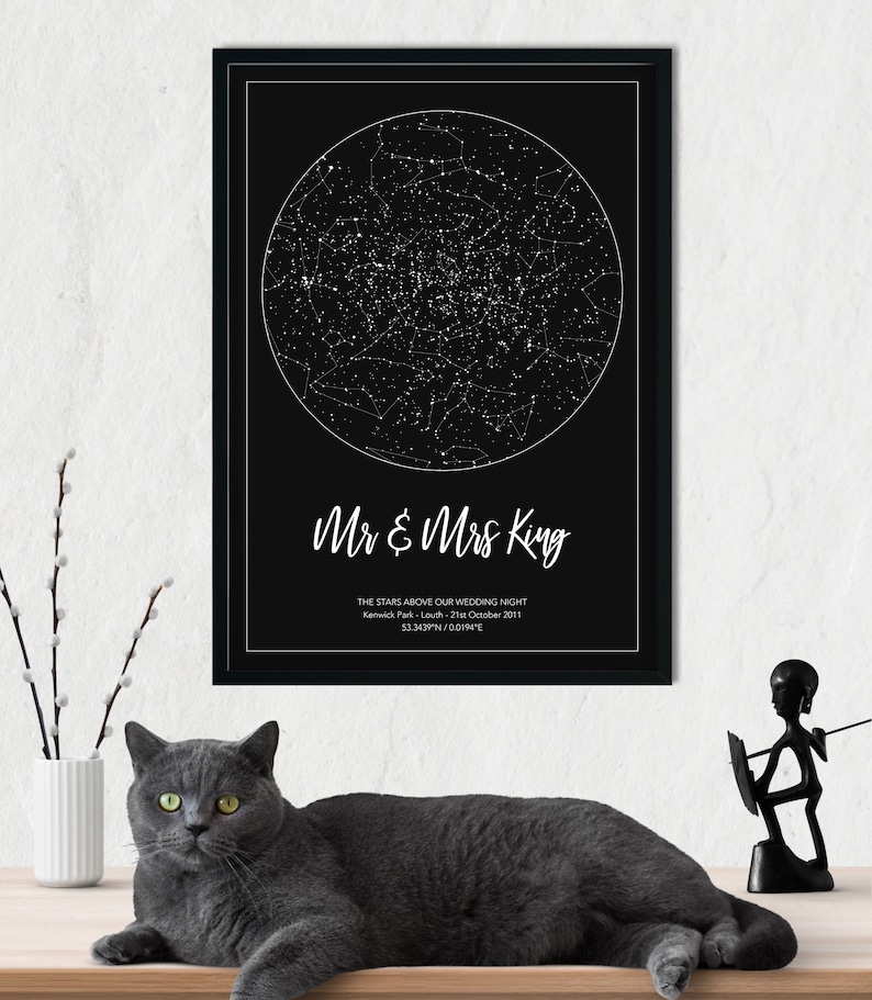May include: A black and white star map print with the text "Mr & Mrs King" and "THE STARS ABOVE OUR WEDDING NIGHT Kenwick Park - Louth - 21st October 2011 53.3439&deg;N/001.94&deg;E".