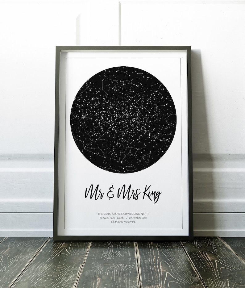 May include: A black and white star map print with the text "Mr & Mrs King" and "THE STARS ABOVE OUR WEDDING NIGHT Kenwick Park - Louth - 21st October 2011 53.3439N/00194&deg;E"