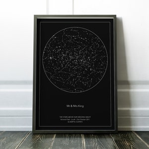 May include: A black and white star map print with the text "Mr & Mrs King" and "THE STARS ABOVE OUR WEDDING NIGHT Kenwick Park - Louth - 21st October 2011 53.3439&deg;N/0.0194&deg;E".