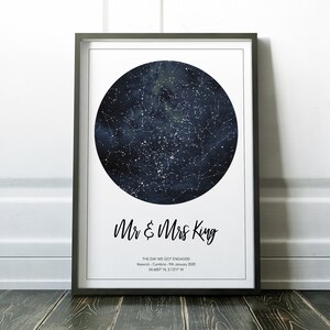 May include: A black and white printable art print with a dark blue circle representing the night sky with stars. The text "Mr & Mrs King" is below the circle with the text "THE DAY WE GOT ENGAGED" and "Keswick - Cumbria - 9th January 2020" and "54.6000 N, 3.1371 W" below that.