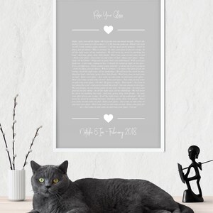 May include: A gray and white printable wedding vow template with the text "Raise Your Glass" and a heart. The text includes a wedding vow poem and the names "Natasha & Ian" and the date "February 2018".