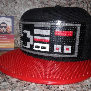 KIDS Size Nintendo Snapback Hat  Style Video Game Retro Pixel Hat (Red Brim)