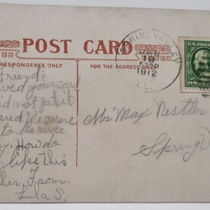 May include: Vintage postcard with handwritten message, postmarked Spring Valley, Illinois, dated January 19, 1912. Features a green one-cent postage stamp and a red "Post Card" header.