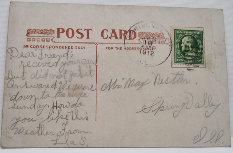 May include: Vintage postcard with handwritten message, postmarked Spring Valley, Illinois, dated January 19, 1912. Features a green one-cent postage stamp and a red "Post Card" header.
