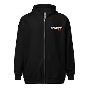 May include: Black zip-up hoodie with a white graphic that says "COYOTE 5.0" in a stylized font.