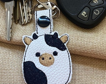 Squishy Cow Keychain: Embroidered Faux Leather Snap Tab