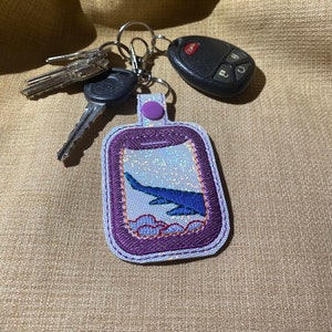 Plane-window Key Chain/ /Snap Tab/ airline/ travel/airplane/window/school bag/backpack/luggage tag
