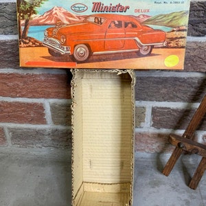 Boxed Tinplate Minister Delux Friction-Driven Black Pontiac Regd.No.A