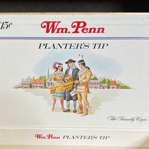 May include: A vintage box of Wm. Penn Planter's Tip cigars, featuring a colorful illustration of William Penn, a Native American, and a woman in colonial dress. The box is white with red and blue accents and the text "2/15¢" and "The Friendly Cigar".