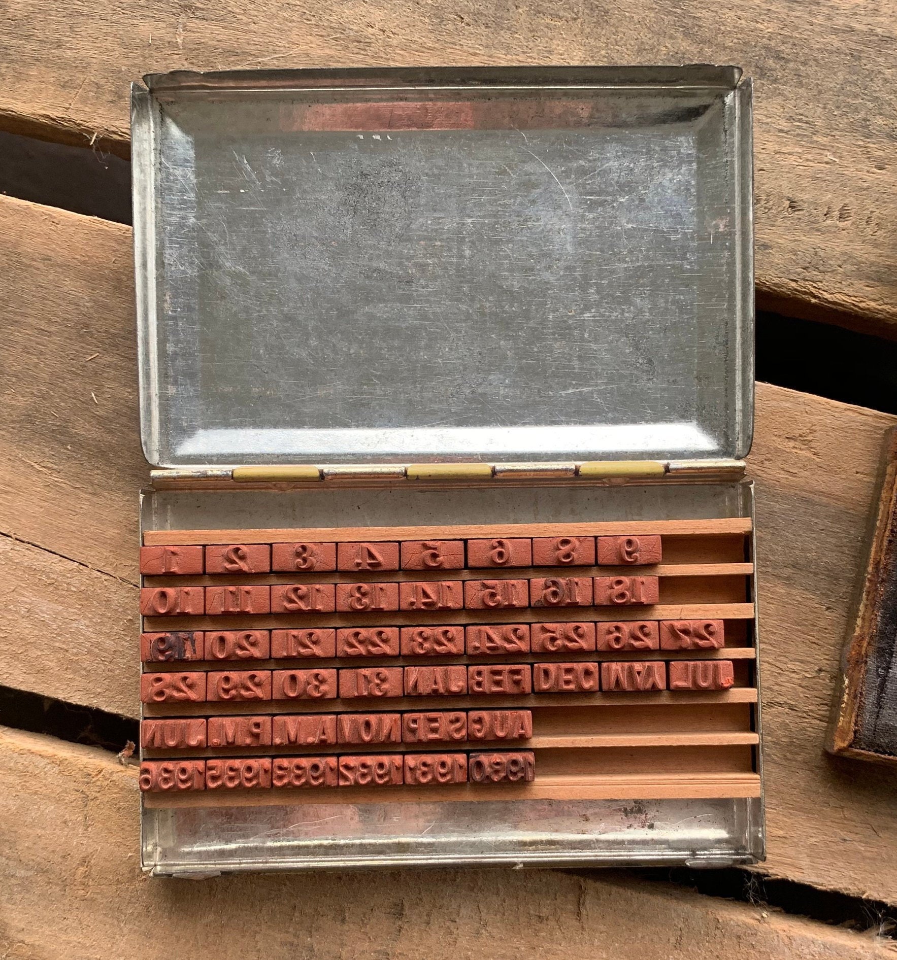 Vintage Stamp Dates and Ink Printing Tin Early Advertising Red Face