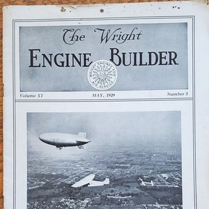 May include: A black and white photo of a magazine cover for The Wright Engine Builder, Volume XI, May 1929. The cover features a photo of a Goodyear dirigible and a Ford trimotor airplane flying over a city. The text "When in dirigible or plane you ride Let right judgment be your guide" is printed below the photo.