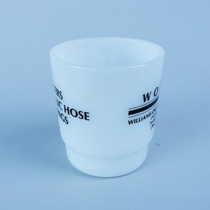 May include: White ceramic mug with black text that reads "Peters Hydraulic Hose Fittings" and "Williams Oil-O-Matic Factory Branch (208) 342-7777".