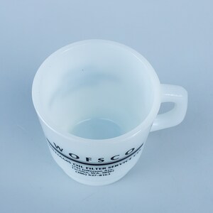 May include: White ceramic mug with a black logo that reads "Wofsco Oil Filter Service Co. 1741 Jefferson Ave. Tacoma, WA. 98402 (206) 627-8163"
