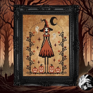 May include: Framed cross-stitch art featuring a witch in a tall hat and dress, surrounded by ghosts, pumpkins, and a crescent moon. The artwork is in shades of orange, black, and white, set against a tan background, and framed in a black ornate frame.