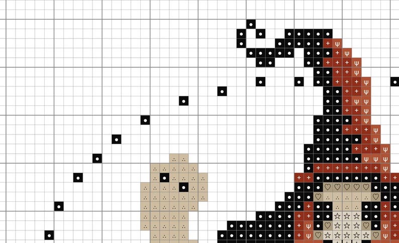 May include: Cross-stitch pattern featuring a whimsical design. The pattern includes a witch's hat in black and brown, a small figure, and a trail of black squares. The design is set against a white grid background.