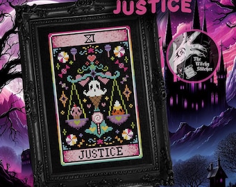 May include: A framed cross-stitch art piece titled JUSTICE, featuring a scale design with a ghost ice cream cone, a skull cupcake, and candy corn. The black fabric background is decorated with colorful candy motifs and the Roman numeral XI.