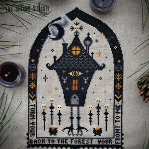 May include: Black and white cross stitch pattern of a spooky house with a black cat and the text "Turn your back to the forest, your front to me".