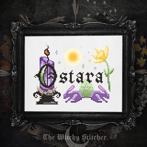 May include: A cross-stitch pattern in a black frame featuring the text Ostara in black gothic lettering. The design includes a purple candle, a yellow flower, a pale green egg with a pentagram, and two purple rabbits under a yellow sun.