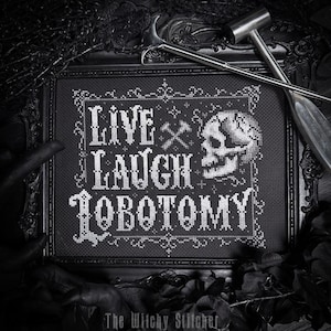 May include: Black framed cross-stitch art with the words "Live Laugh Lobotomy" in white. A skull and crossed tools are next to the text. The frame is ornate, and surgical tools are placed on top. The Witchy Stitcher is written at the bottom.