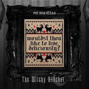 May include: Cross-stitch pattern framed in black. The design features black goats, red accents, and the text "Wouldst thou like to live deliciously?" The frame is ornate, and the words "PDF DOWNLOAD" are at the top.