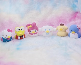 Deux Canards En Caoutchouc Sur Des Rochers Photo - Image Gratuite De