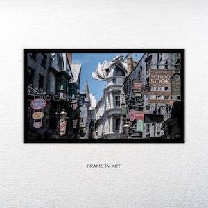 May include: A framed print of a detailed street scene with shops and signs, featuring a dragon statue atop a building. The image has a black frame and the text "FRAME TV ART" at the bottom.