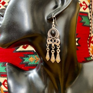 Uniquely designed dangling earrings from the Heart of Asia with Kyrgyz, Uzbek, Turkmen, Kazakh national patterns with notes of history
