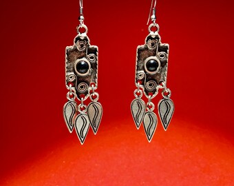 Charming dangling earrings from Kyrgyzstan, the heart of Central Asia. Vintage earrings with Kyrgyz national patterns with notes of history.