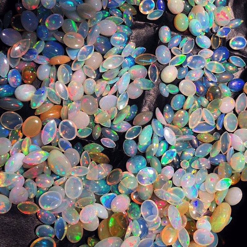 1.35 Cts 7X10 MM Natural Black Ethiopian Opal Cabochon Shape Oval Rainbow Fire Celebrated Opal Welo Fire Smooth Gemstone Opal Cabs Ring