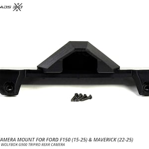 以下が含まれることがあります： Ford F150 (15-25) & Maverick (22-25) 用の黒い Wolfbox カメラマウント。マウントにはネジが含まれています。「CROSSROADS」の文字が上部にあります。アメリカ製。