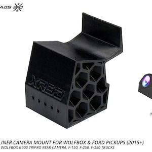 May include: Black rear headliner camera mount for Wolfbox and Ford pickups. The mount has a unique honeycomb design and is compatible with the G900 Tripro rear camera. The text "XR35" is visible on the mount.
