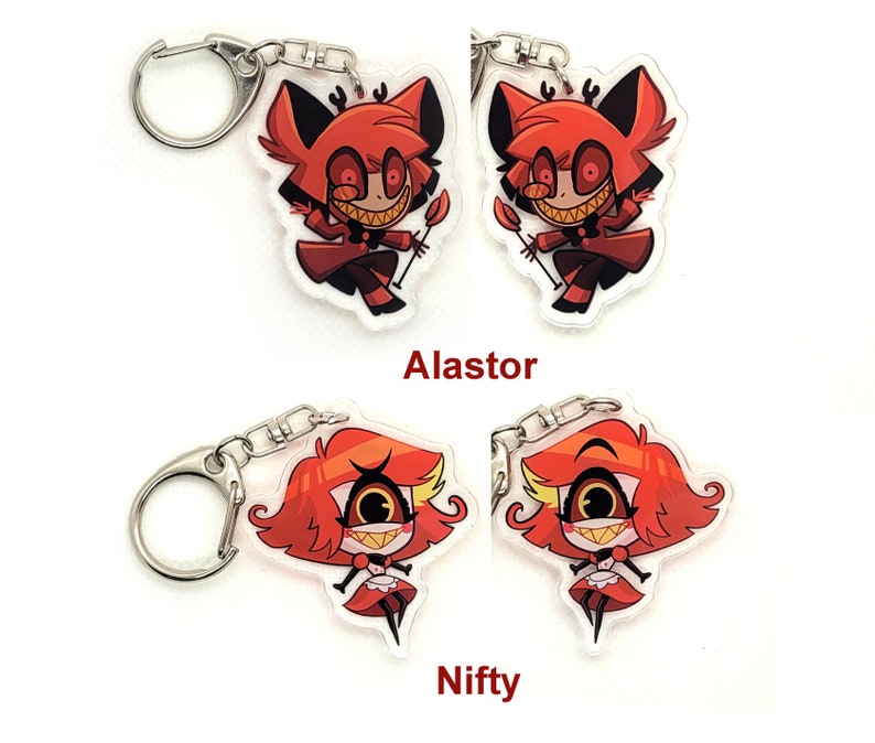 Puede incluir: Dos juegos de llaveros con personajes de dibujos animados de la serie animada Hazbin Hotel. El primer juego presenta al personaje Alastor, un demonio rojo con cuernos, una amplia sonrisa y un atuendo rojo y negro. El segundo juego presenta al personaje Niffty, un demonio rojo con un solo ojo grande, una amplia sonrisa y un vestido rojo y blanco.