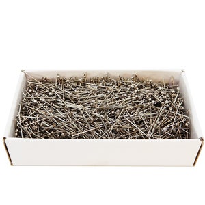 May include: A white cardboard box filled with silver sewing pins.