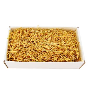 May include: A white box filled with a large quantity of gold-colored straight pins.