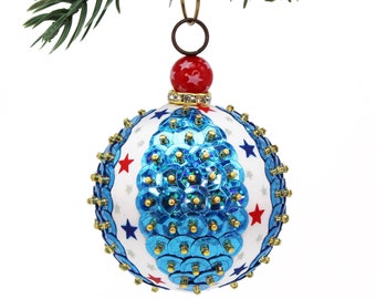 Patriotic Americana Ornament with Red and Blue Stars on White Ribbon and Metallic Blue Sequins. USA Red White & Blue for 4th of July Decor.