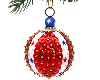 Patriotic Americana Ornament with Red and Blue Stars on White Ribbon and Metallic Red Sequins. USA Red White & Blue for 4th of July Decor.