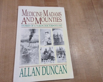 Medicine Madams and Mounties Yukon Doctor by Allan Duncan 1989 paperback in good pre owned condition.   (w9)