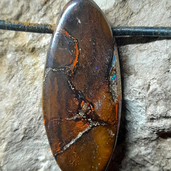 Boulder opal pendant drilled on the side