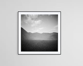 A stunning black and white photograph featuring a picturesque mountain range, dark photography, pinhole photography print, wall art