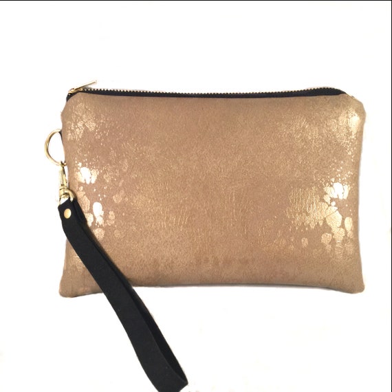 gold wristlet bag