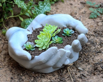 Concrete planter hands