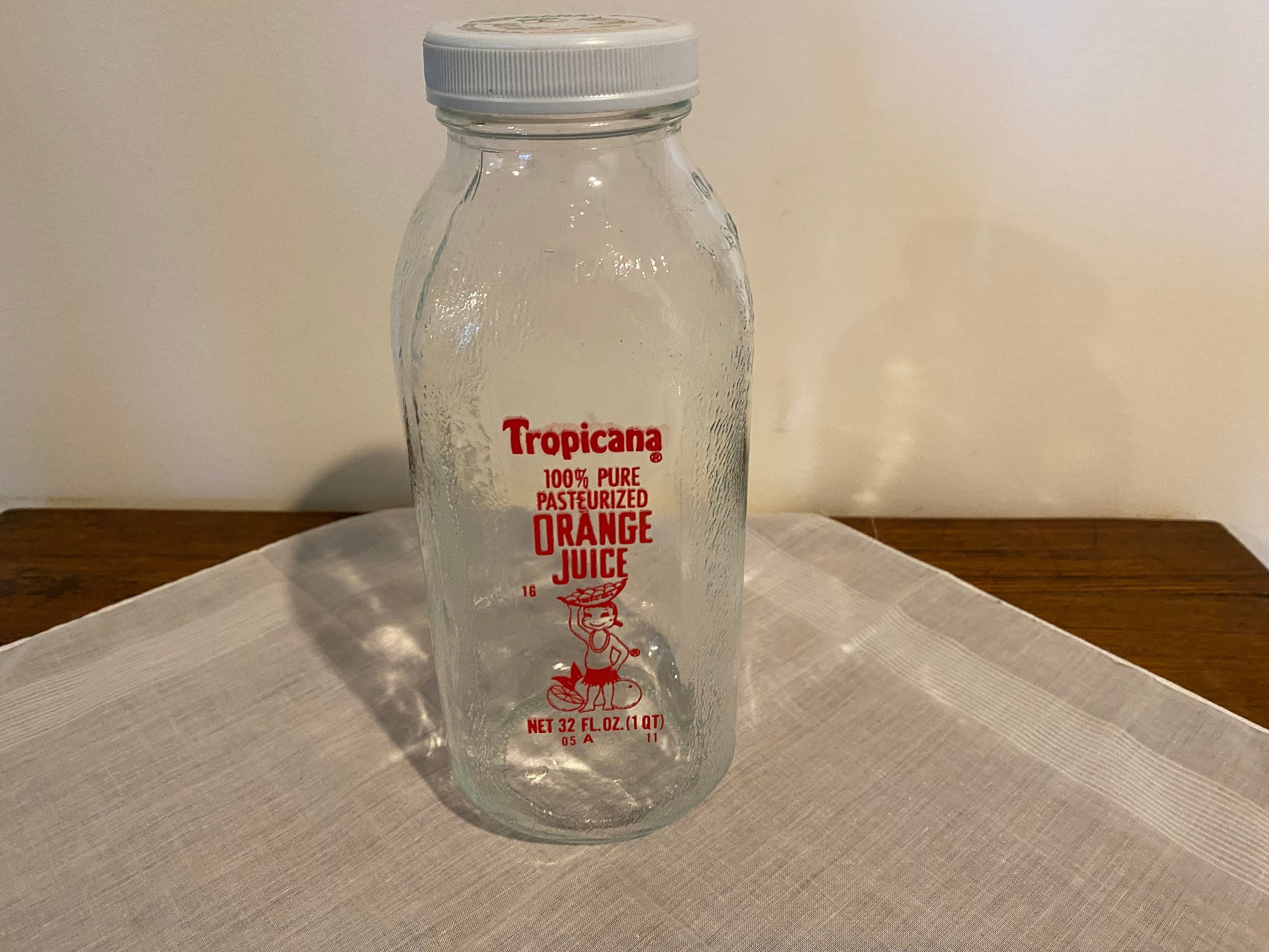Tropicana glass clearance bottle