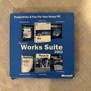 May include: A blue Microsoft Works Suite 2003 software box featuring images of included programmes: Works, Word, Money 2003, Encarta Encyclopedia Standard 2003, Picture It! Photo, and Streets & Trips 2002. The text reads Productivity & Fun For Your Home PC.