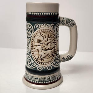 1983 Vintage Mini Avon Sporting Stein Collectible - 2 faces (dog and fish) Glossy finish