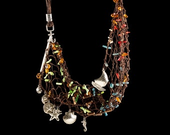 The Deep Sea - knotted net necklace with sterling silver pendants, amber, coral and wood beads